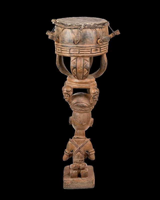 Woman carrying a drum, 19th century