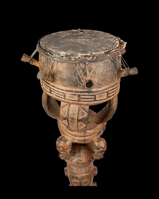 Woman carrying a drum, 19th century