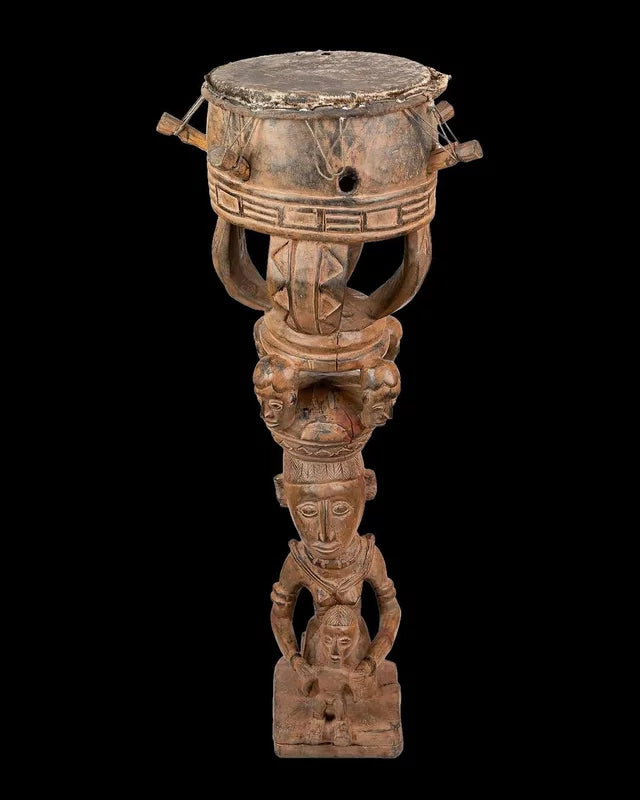 Woman carrying a drum, 19th century